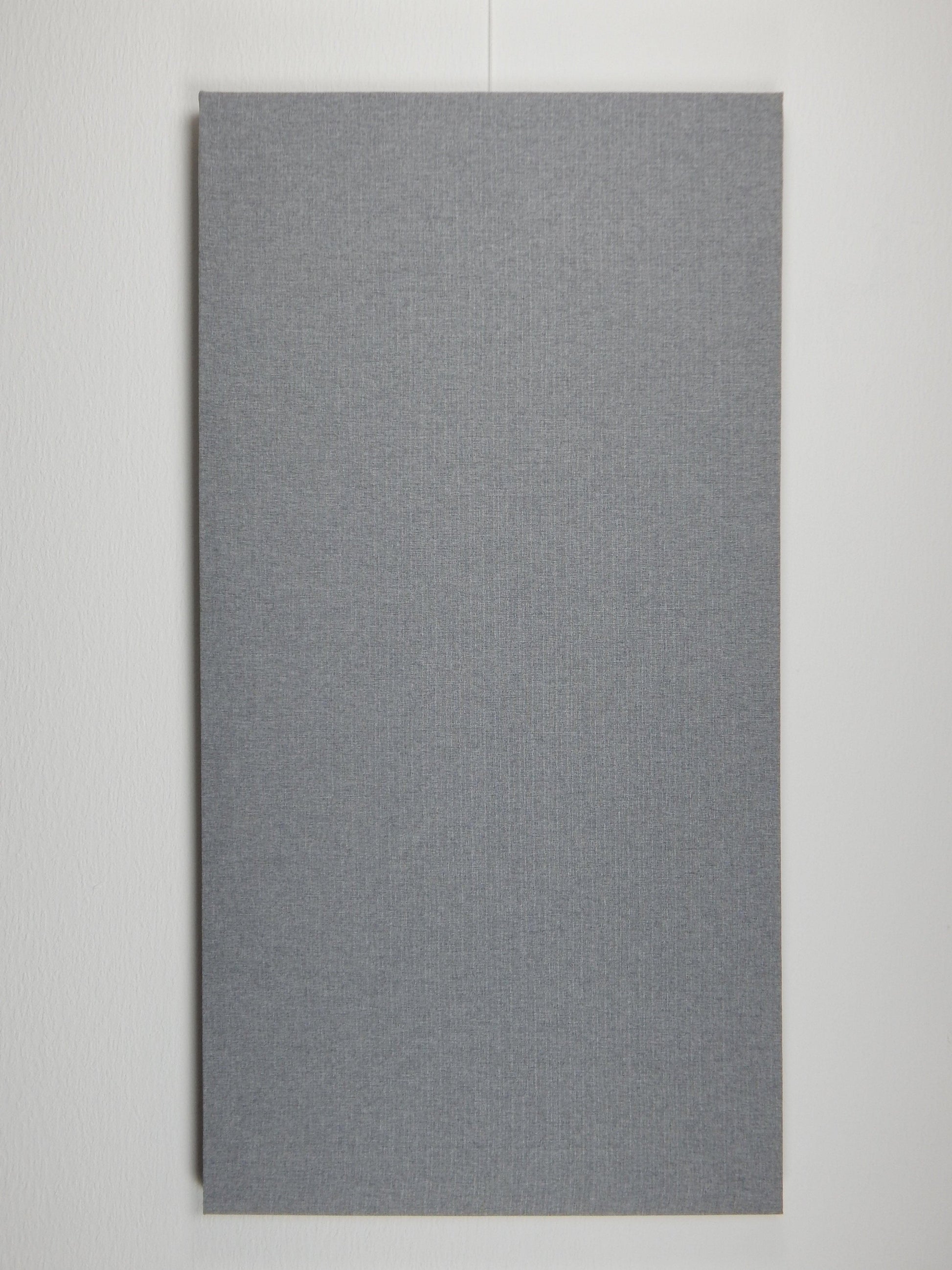 Vooraanzicht lichtgrijs akoestisch wandpaneel met patroon